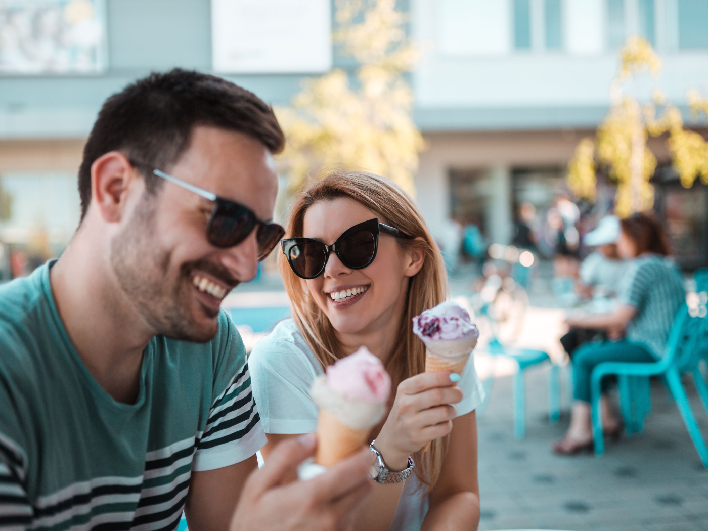 People enjoying rolled ice cream desserts